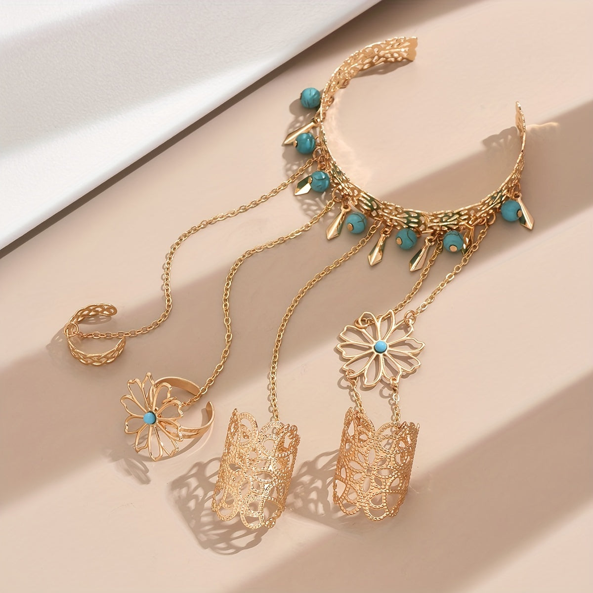 Boho-Chic Golden Hollow Floral Finger Bracelet with Blue Turquoise Tassel - Alloy, Resin Inlay for Vacation & Party Wear