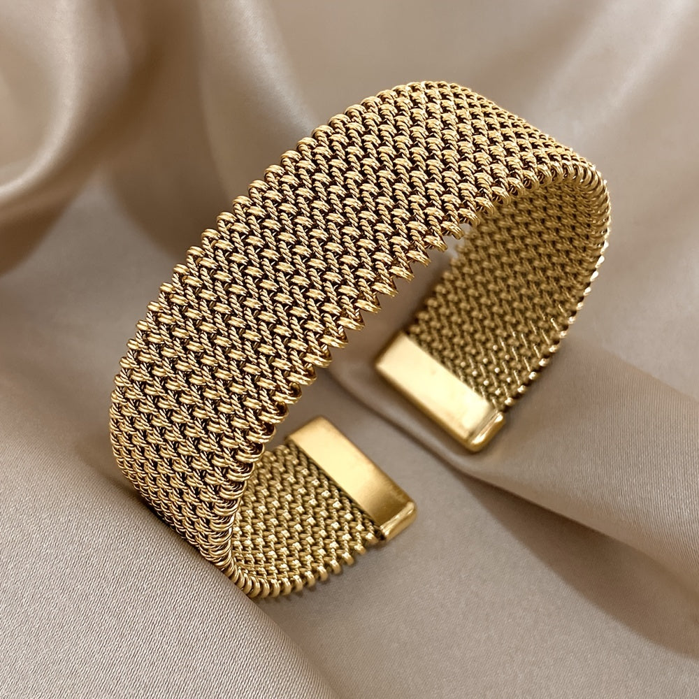 Trendy New Woven Stainless Steel Bracelet With A Golden Touch. Fashionable Accessory In Versatile Golden Tone.